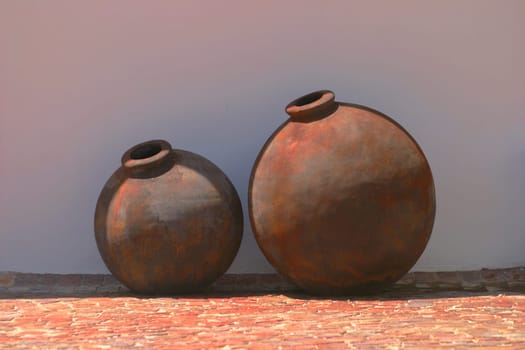 Two amphora for wine in south africa on a vineyard