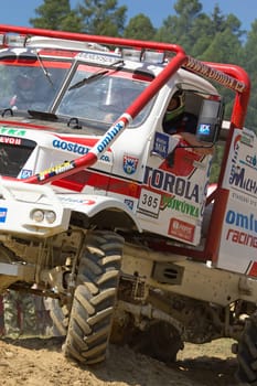 MOHELNICE, CZECH REPUBLIC - MAY 20. Unidentified racer passes through difficult terrain in the "Grand Prix Truck Trial 2012"" on May 20, 2012 in the town of Mohelnice, Czech Republic."