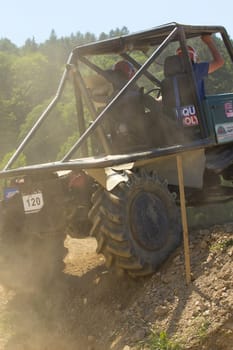 MOHELNICE, CZECH REPUBLIC - MAY 20. Unidentified racer passes through difficult terrain in the "Grand Prix Truck Trial 2012"" on May 20, 2012 in the town of Mohelnice, Czech Republic."