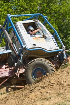 MOHELNICE, CZECH REPUBLIC - MAY 20. Unidentified racer passes through difficult terrain in the "Grand Prix Truck Trial 2012"" on May 20, 2012 in the town of Mohelnice, Czech Republic."