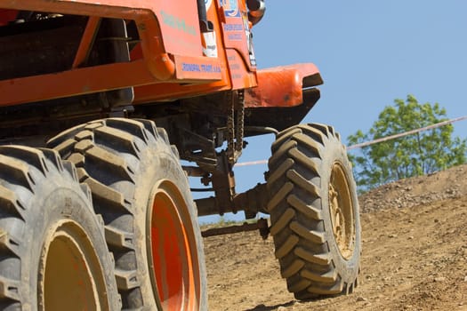 MOHELNICE, CZECH REPUBLIC - MAY 20. Detailed view of orange truck at difficult terrain in the "Grand Prix Truck Trial 2012"" on May 20, 2012 in the town of Mohelnice, Czech Republic."