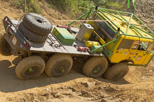 MOHELNICE, CZECH REPUBLIC - MAY 20. Unidentified racer s down a steep slope in the "Grand Prix Truck Trial 2012"" on May 20, 2012 in the town of Mohelnice, Czech Republic."