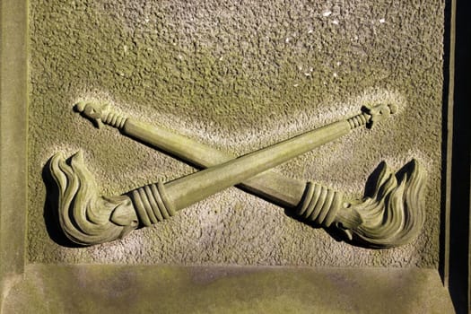 Torches on a gravestone (Hamelin Cemetery)