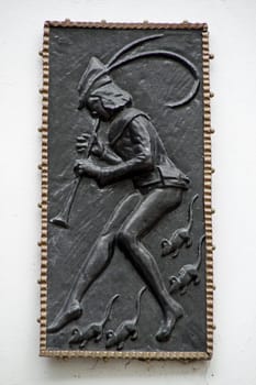 Pied Piper relief in Hamelin