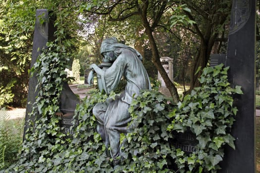 Grave figure in a cemetery in Hamelin