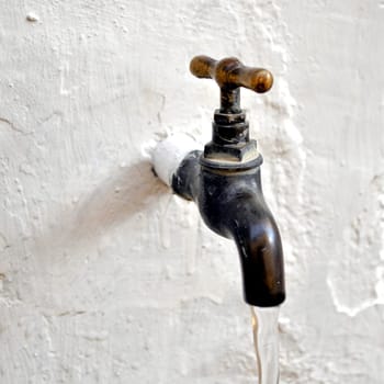 Detail of a water tap valve faucet spigot
