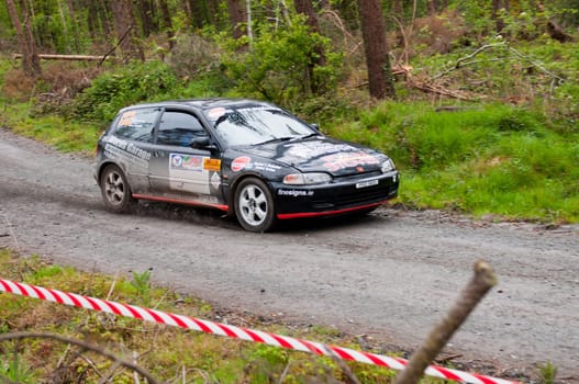 MALLOW, IRELAND - MAY 19: J. Lowery driving Honda Civic at the Jim Walsh Cork Forest Rally on May 19, 2012 in Mallow, Ireland. 4th round of the Valvoline National Forest Rally Championship.