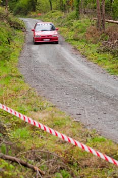 MALLOW, IRELAND - MAY 19: S. Lane driving Toyota Corolla at the Jim Walsh Cork Forest Rally on May 19, 2012 in Mallow, Ireland. 4th round of the Valvoline National Forest Rally Championship.
