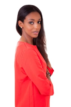 Portrait of a beautiful young black woman with folded arms isolated on white background