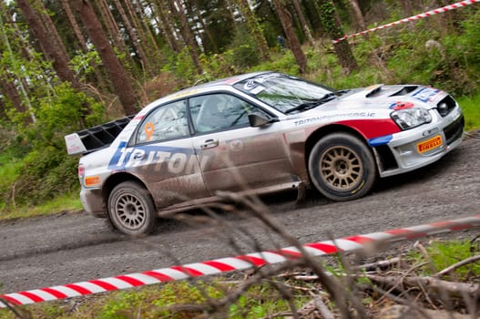 MALLOW, IRELAND - MAY 19: K. Barrett driving Subaru Impreza at the Jim Walsh Cork Forest Rally on May 19, 2012 in Mallow, Ireland. 4th round of the Valvoline National Forest Rally Championship.