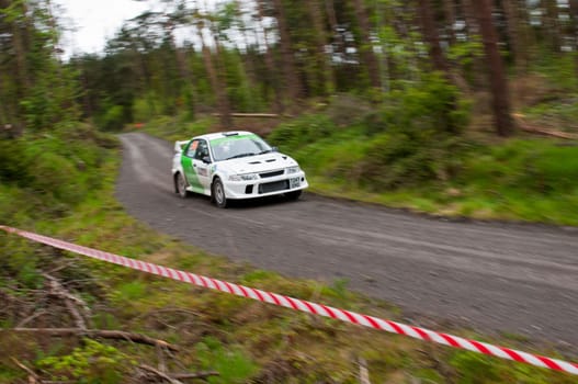 MALLOW, IRELAND - MAY 19: J. Laverty driving Mitsubishi Evo at the Jim Walsh Cork Forest Rally on May 19, 2012 in Mallow, Ireland. 4th round of the Valvoline National Forest Rally Championship.