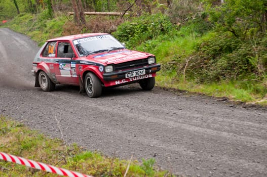 MALLOW, IRELAND - MAY 19: S. Mcgirr driving Toyota Starlet at the Jim Walsh Cork Forest Rally on May 19, 2012 in Mallow, Ireland. 4th round of the Valvoline National Forest Rally Championship.