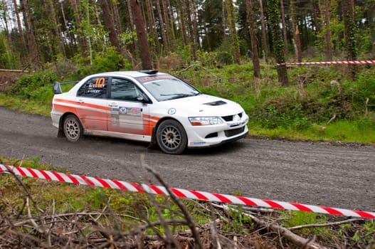 MALLOW, IRELAND - MAY 19: G. Lucey driving Mitsubishi Evo at the Jim Walsh Cork Forest Rally on May 19, 2012 in Mallow, Ireland. 4th round of the Valvoline National Forest Rally Championship.