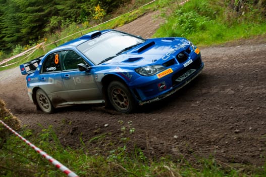 MALLOW, IRELAND - MAY 19: M. Cairns driving Subaru Impreza at the Jim Walsh Cork Forest Rally on May 19, 2012 in Mallow, Ireland. 4th round of the Valvoline National Forest Rally Championship.