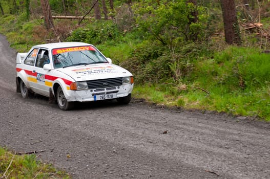 MALLOW, IRELAND - MAY 19: M. Sheedy driving Ford Escort at the Jim Walsh Cork Forest Rally on May 19, 2012 in Mallow, Ireland. 4th round of the Valvoline National Forest Rally Championship.