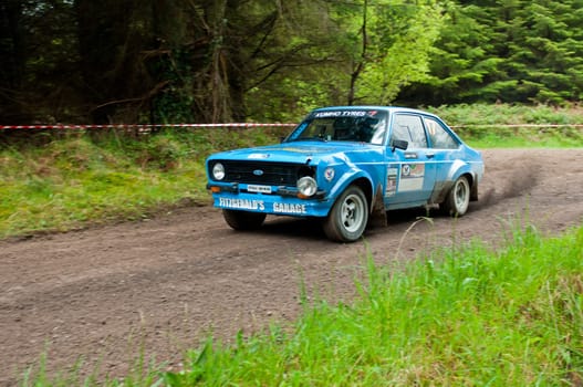 MALLOW, IRELAND - MAY 19: P. Fitzgerald driving Ford Escort at the Jim Walsh Cork Forest Rally on May 19, 2012 in Mallow, Ireland. 4th round of the Valvoline National Forest Rally Championship.