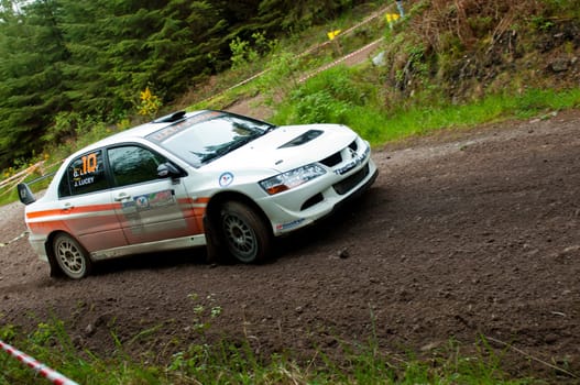 MALLOW, IRELAND - MAY 19: G. Lucey driving Mitsubishi Evo at the Jim Walsh Cork Forest Rally on May 19, 2012 in Mallow, Ireland. 4th round of the Valvoline National Forest Rally Championship.