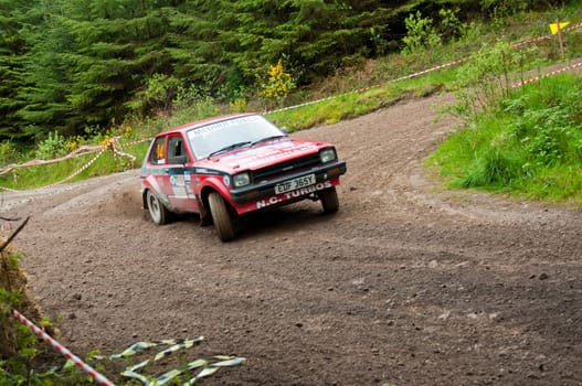 MALLOW, IRELAND - MAY 19: S. Mcgirr driving Toyota Starlet at the Jim Walsh Cork Forest Rally on May 19, 2012 in Mallow, Ireland. 4th round of the Valvoline National Forest Rally Championship.