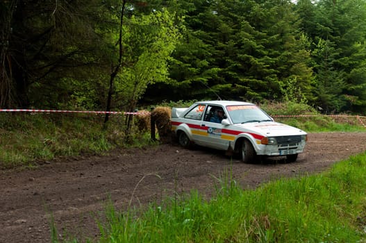 MALLOW, IRELAND - MAY 19: M. Sheedy driving Ford Escort at the Jim Walsh Cork Forest Rally on May 19, 2012 in Mallow, Ireland. 4th round of the Valvoline National Forest Rally Championship.
