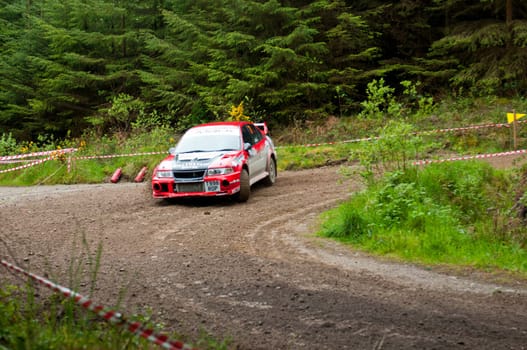 MALLOW, IRELAND - MAY 19: S. Wright driving Mitsubishi Evo at the Jim Walsh Cork Forest Rally on May 19, 2012 in Mallow, Ireland. 4th round of the Valvoline National Forest Rally Championship.