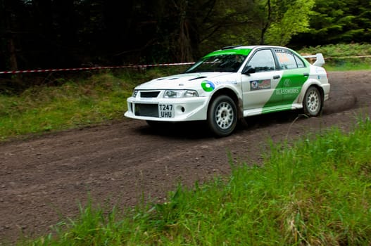 MALLOW, IRELAND - MAY 19: J. Laverty driving Mitsubishi Evo at the Jim Walsh Cork Forest Rally on May 19, 2012 in Mallow, Ireland. 4th round of the Valvoline National Forest Rally Championship.