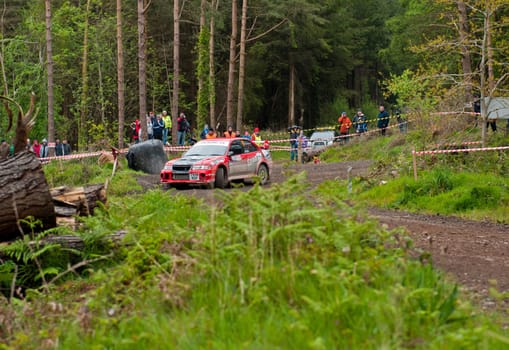 MALLOW, IRELAND - MAY 19: S. Wright driving Mitsubishi Evo at the Jim Walsh Cork Forest Rally on May 19, 2012 in Mallow, Ireland. 4th round of the Valvoline National Forest Rally Championship.