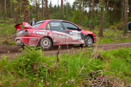 MALLOW, IRELAND - MAY 19: P. O&#039  Connell driving Mitsubishi Evo at the Jim Walsh Cork Forest Rally on May 19, 2012 in Mallow, Ireland. 4th round of the Valvoline National Forest Rally Championship.