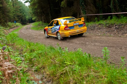MALLOW, IRELAND - MAY 19: P. Barrett driving Mitsubishi Evo at the Jim Walsh Cork Forest Rally on May 19, 2012 in Mallow, Ireland. 4th round of the Valvoline National Forest Rally Championship.