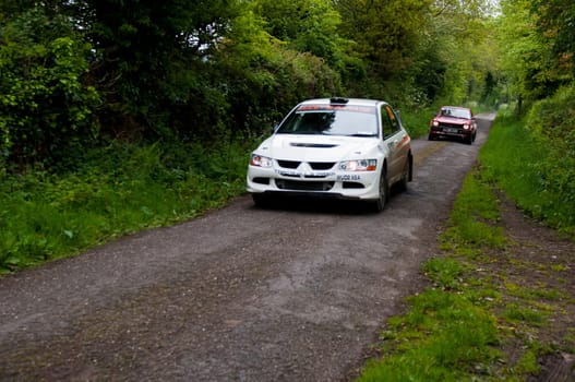 MALLOW, IRELAND - MAY 19: G. Lucey driving Mitsubishi Evo at the Jim Walsh Cork Forest Rally on May 19, 2012 in Mallow, Ireland. 4th round of the Valvoline National Forest Rally Championship.