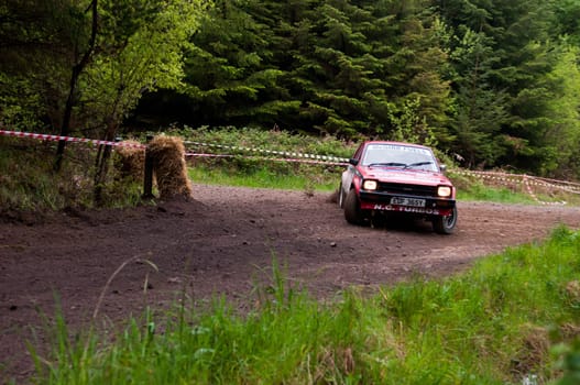 MALLOW, IRELAND - MAY 19: S. Mcgirr driving Toyota Starlet at the Jim Walsh Cork Forest Rally on May 19, 2012 in Mallow, Ireland. 4th round of the Valvoline National Forest Rally Championship.
