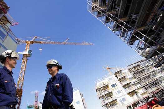 two building workers and construction industry