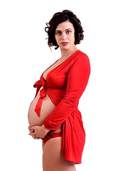 Beautiful pregnant woman posing with red shirt