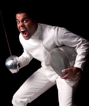 Male fencer isolated in a dark background