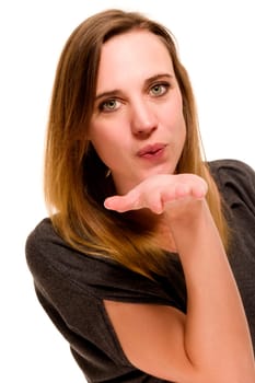 Woman sending hand kiss against white background