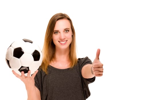 Woman with soccer ball showing thumbs up against white background