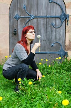 Woman with dandelion