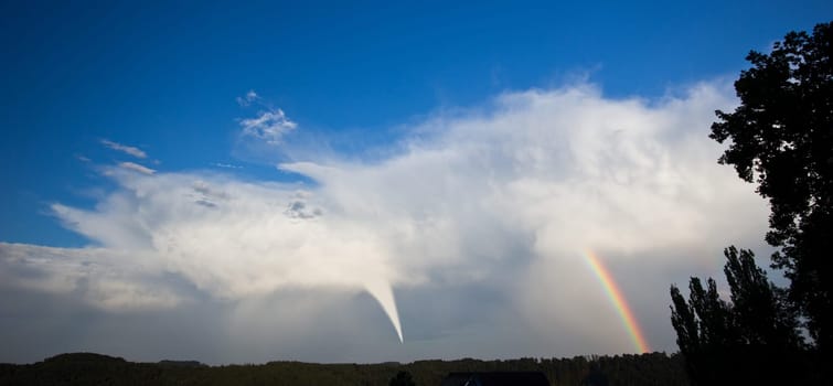 Tornado and rainbow