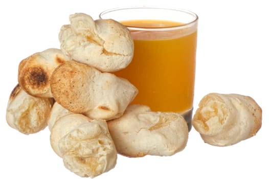 yucca bread and mango juice on white background