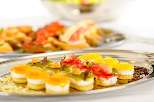 Appetizers mini desserts on catering buffet white tablecloth
