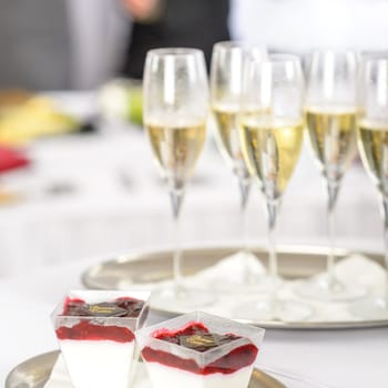 Champagne toast glasses for business meeting conference participants