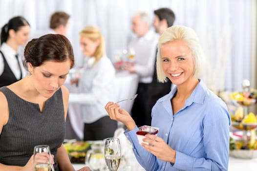 Business meeting buffet smiling woman eat dessert formal company event