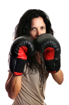 Young girl with boxing glove isolated in white