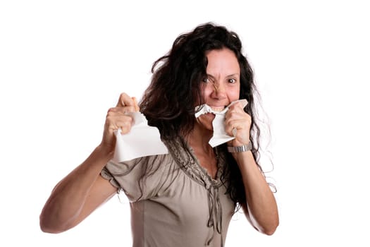 Angry woman eating paper isolated in white