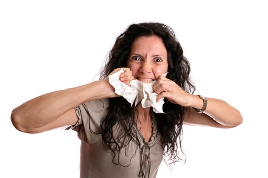 Angry woman eating paper isolated in white