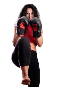 Young girl with boxing glove isolated in white