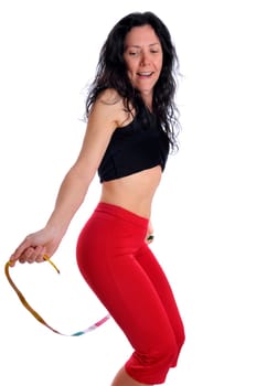Mature fit woman with measuring tape isolated in white