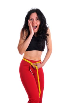 Mature fit woman with measuring tape isolated in white