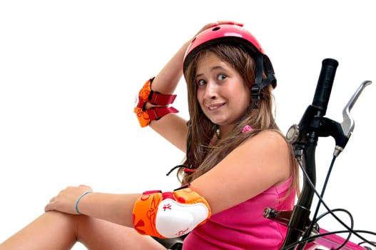 Beautiful young girl in a bicycle crash isolated in white
