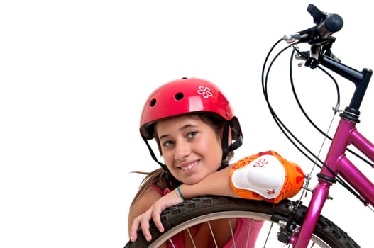Beautiful young girl with a bicycle isolated in white