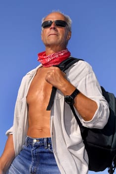 Handsome mature model posing outdoors
